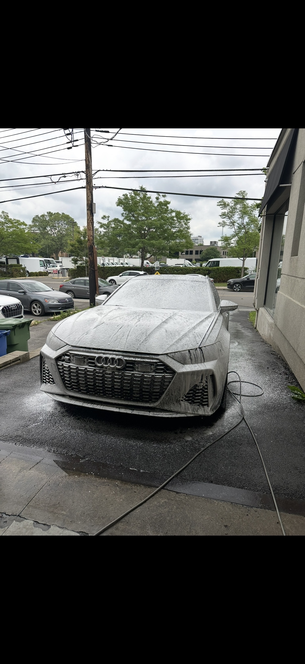 Audi covered in foam during an exterior wash